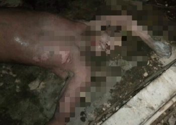 Foto mayat Rasman Siagian yang ditemukan tak bernyawa dalam sumur.