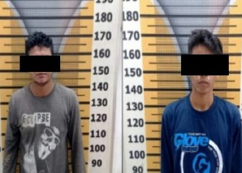 Kedua tersangka saat diamankan di Mapolres Tebingtinggi. (Foto: istimewa)