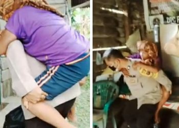 AIPTU Azhar Nasution saat menggendong Rosmawati boru Tamba (60) ke dalam rumahnya yang sehari-harinya hidup sebatang kara dan lumpuh.