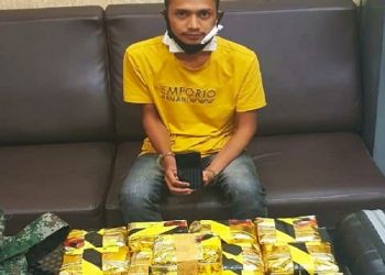 Kurir narkoba yang ditangkap bersama barang bukti 13 kilogram sabu-sabu di Jalinsum ruas Medan-Banda Aceh, Kecamatan Tanjung Pura, Kabupaten Langkat. (Foto: Istimewa)