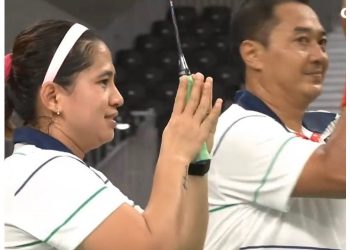 Pasangan ganda campuran Indonesia, Hary Susanto/Leani Ratri Oktila berhasil meraih medali emas di Paralimpiade Tokyo 2020. (Foto: Twitter/@TeamINAOffical)