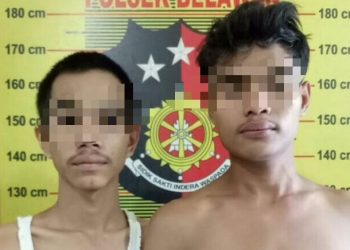 Foto kedua pelaku curanmor yang dibekuk Polres Pelabuhan Belawan.