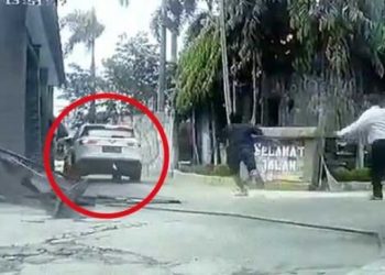 Tangkapan layar rekaman CCTV pengejaran tersangka pembunuhan di hotel Medan. [Ist]