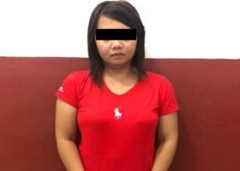 Ni Putu AS menggelapkan uang hasil penjualan pulsa sebesar Rp638 juta untuk judi online. (Foto: MNC/Chusna)