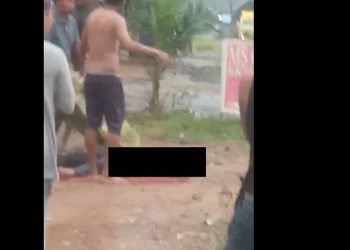 Karyawati di Lampung Tiur tewas ditembak kepalanya oleh perampok yang membawa kabur Rp50 juta. (Foto: MPI/Jimi Irawan).