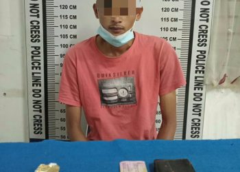Foto pelaku dan barang bukti saat di kantor Polisi.