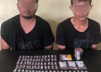 Foto kedua tersangka dan barang bukti sabu yang diamankan Sat Narkoba Polres Simalungun.