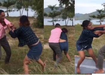 Seorang wanita dan pria terlibat adu jotos di Taman Kota Larantuka, Flores Timur. Aksi keduanya mendadak heboh dan viral di media sosial. Foto: iNewsTV/Joni Nura/Video Viral