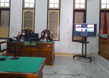 Tikam abang kandung hingga tewas karena dimabuk tuak, Maralus Nauli Sitompul warga Gang Selamat, Kelurahan Sitirejo dituntut 5 tahun penjara di Pengadilan Negeri Medan, Rabu (6/7/2022). TRIBUN MEDAN/GITA NADIA PUTRI TARIGAN