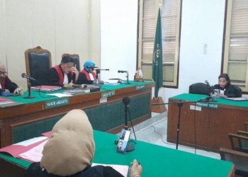 Hisarma Pancamotan Manalu, terdakwa penganiayaan berujung tewasnya tahanan Polrestabes Medan bernama Hendra Syahputra kini dituntut 9 tahun penjara di Pengadilan Negeri Medan, Kamis (14/7/2022). TRIBUN MEDAN/GITA