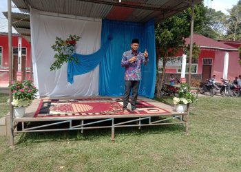 Gusmiyadi saat memberikan sambutan pada acara perayaan Tahun Baru Islam 1444 Hijriah, di Nagori Bukit Rejo, Kabupaten Simalungun.