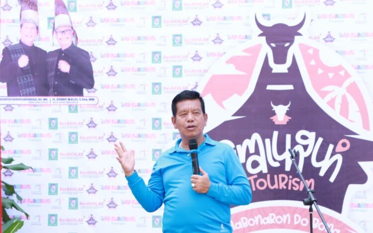 Bupati Simalungun saat launching Apalikasi Simalungun Tourism, di Kota Parapat, Kecamatan Girsang Sipangan Bolon, Kabupaten Simalungun, Sumut, Sabtu (24/9/2022).