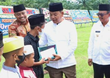 Pemberian tali asih dan sembako kepada 50 orang anak yatim oleh Bupati Simalungun bersama Wakil Bupati dan dari PT Kinra KEK Sei Mangkei.