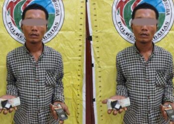 TG (33) warga Asrama Widuri Blok Sengon Medan. Ia ditangkap karena kedapatan menyimpan narkotika jenis sabu di dalam saku bajunya. Istimewa