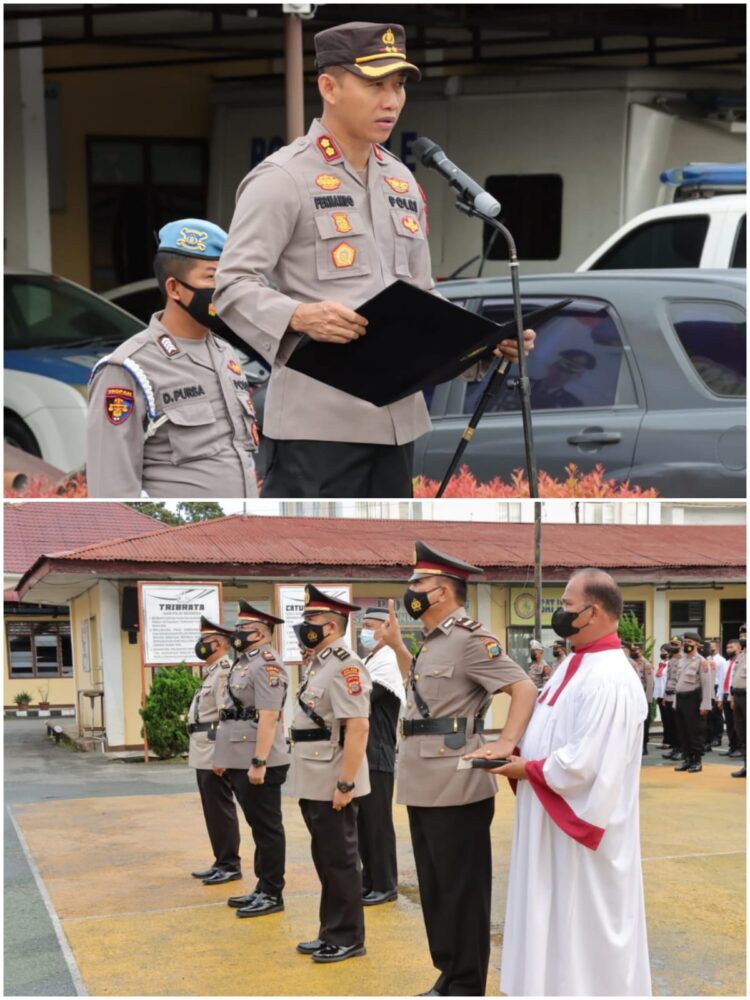 Kapolres Pematang Siantar saat pimpin sertijab Kasat Intelkam dan Kapolsek Siantar Timur, pada Senin (5/12/2022),  pukul 08.00 WIB, di Lapangan Apel Polres Pematang Siantar.