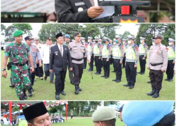 Polres Simalungun menggelar apel gelar pasukan Operasi Lilin Toba 2022, di Lapangan Koramil Type-A, Jalan Asahan, Km.4,5, Kecamatan Siantar, Kabupaten Simalungun, Kamis (22/12/2022).