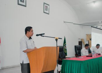 Plt. Kepala Bapelitbangda Humbahas, Pahala Lumbangaol saat menyampaikan kata sambutan.
