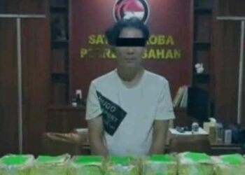 Syahrul Syaputra (46) terduga kurir sabu-sabu seberat 50 Kilogram yang ditangkap Sat Narkoba Polres Asahan. TRIBUN MEDAN/HO