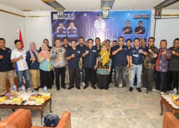 Foto bersama disela acara.