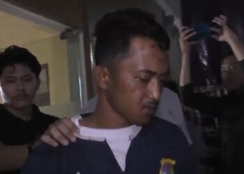 Tersangka Berry Primanael Hasadaon (28) ditangkap usai membunuh istrinya, Siti Hasanah (30) di Dipasena Sejahtera, Tulang Bawang, Lampung. Foto/iNews TV/Ahmad Luthfi Rosyadi