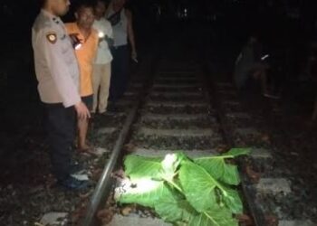 Dua remaja di Labuhanbatu Utara tewas tertabrak kereta api saat tiduran di rel. (Foto: MPI/Ikang Amanda)