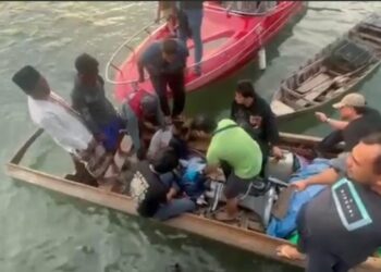 Petugas BNN Provinsi Kepri, bersama Satreskoba Polresta Barelang, berhasil menggagalkan penyelundupan 11.467 butir pil ekstasi lewat jalur laut. Foto/iNews TV/Gusti Yennosa