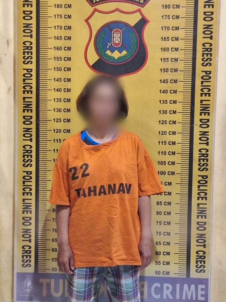 Foto tersangka ditahan Polres Simalungun.