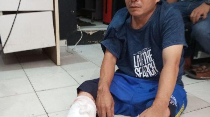 Ahmad Yuda, pelaku pembunuhan sadis yang dilakukan kepada doker TRH (60), pegawai Dinas Kesehatan Pemprov Sumut, warga Kelurahan Buliang, Batuaji, Batam, Kepulauan Riau (Kepri) akhirnya tertangkap, Sabtu (12/11/2023) malam tadi. (DOK YOYOK)