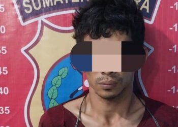 Pelaku LAS saat diamankan di kantor polisi. (Foto: Dok. Polres Tebing Tinggi).