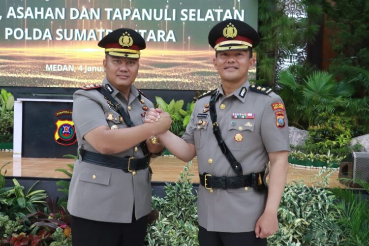 Kapolres Simalungun yang baru, AKBP Choky Sentosa S. Meliala, S.I.K., S.H., M.H., resmi menerima tongkat kepemimpinan.