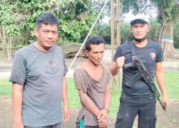 Foto: Pelaku penganiaya sekuriti PTPN 3 di Sergai saat ditangkap. (Istimewa)
