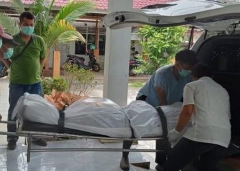 Jenazah korban RNH warga asal Afrika Selatan yang ditemukan tewas di salah satu kamar hotel di Kelurahan Tuktuk Siadong, Kecamatan Simanindo, Kabupaten Samosir, Sumatra Utara, Senin (13/5/2024). (Foto: Ist)