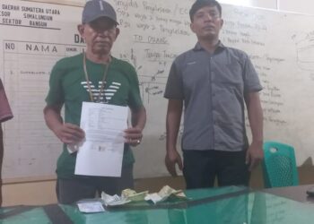Polsek Bangun berhasil mengamankan dua pelaku pungutan liar di Simpang Masjid, Jln. Anjangsana, Nagori Karang Rejo, Kecamatan Gunung Maligas, Kabupaten Simalungun, pada Selasa (16/7/2024).