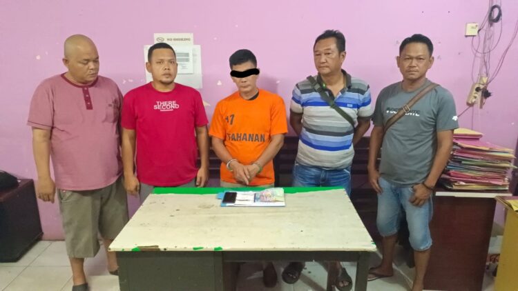 Foto pelaku saat diamankan Polsek Perdagangan.