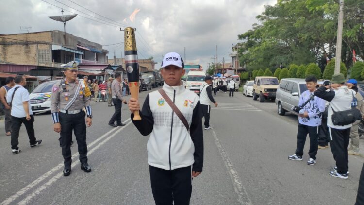 Polres Simalungun kawal Kirab Api PON XXI Tahun 2024 Aceh-Sumut, pada Senin (2/9/2024).