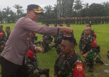 Kapolres Simalungun diwakili Kapolsek Tanah Jawa, Kompol Asmon Bufitra, SH, MH, menghadiri acara penyambutan Satuan Tugas Pengamanan Perbatasan RI-PNG Batalyon Infanteri 122/Tombak Sakti Tahun 2024.