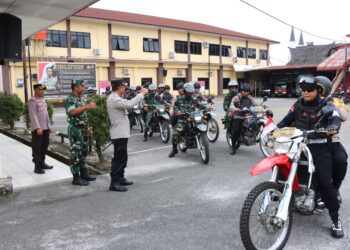 Kapolres Pematangsianțar, AKBP Yogen Heroes Baruno S.H, S.I.K, pimpin Apel Patroli R2 Gabungan, Selasa (26/11/2024), pukul 11.00 WIB.