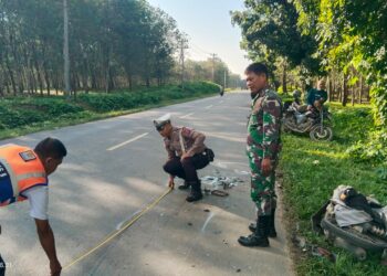 Polisi melakukan olah TKP.