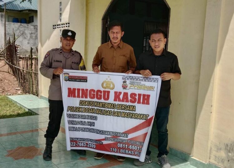 Babinkamtibmas Polsek Bosar Maligas, Aipda H. Sinaga, monitoring serta pengamanan sejumlah tempat ibadah/gereja, di wilayah hukum Polsek Bosar Maligas, pada Minggu (8/12/2024), sekitar pukul 10.30 WIB.