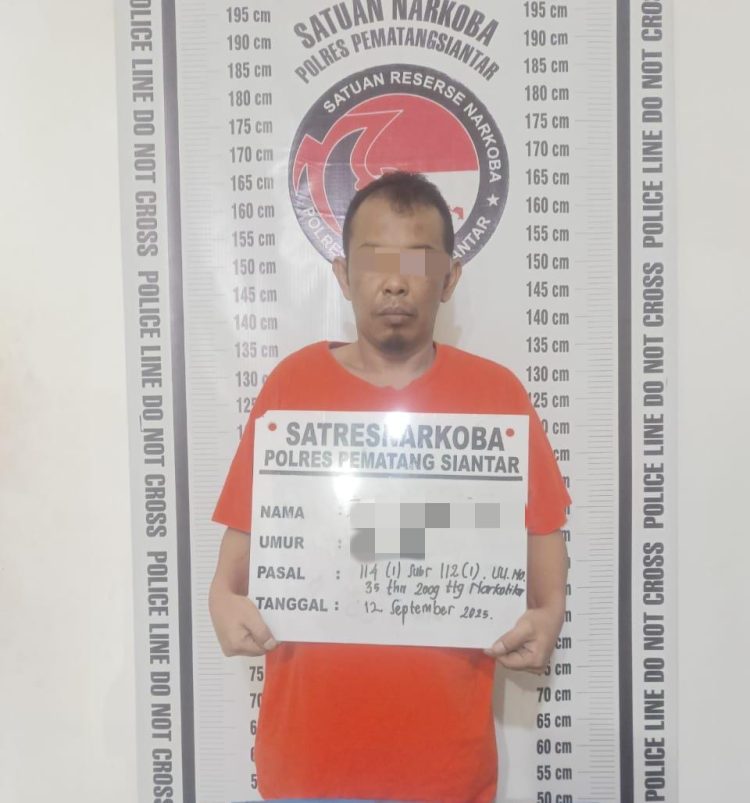 Foto tersangka.