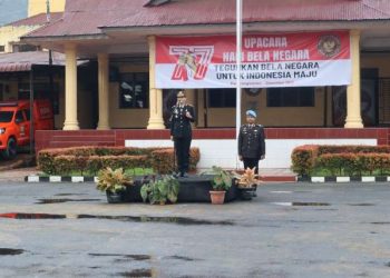 Kapolres Pematangsiantar, AKBP Sah Udur T.M. Sitinjak SH, SIK, MH, sebagai inspektur upacara (Irup)  Bela Negara ke  77 Tahun 2025, pada Jumat (19/12/2025) pagi.