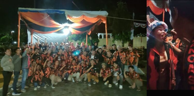 Potho bersama dan Mak Lilis sebagai penasehat Pemuda Pancasila Siantar Barat menerima suapan kue ulang tahun 
Foto: BAL/