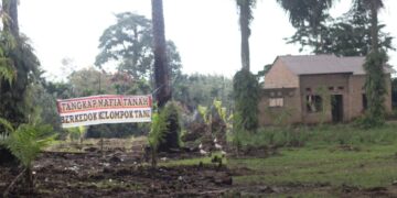 Spanduk di salah satu loksi HGU PTPN 3 Kelurahan Bah Sorma