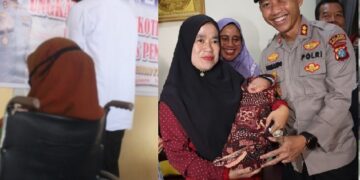 Pasangan pembuang bayi sebelum dinikahkan,  Kapolres  menyambangi bayi  saat digendong ibu Ketua RT             
File Foto: DOK