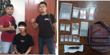 Tersangka diapit petugas dan  barang bukti 
Foto: IST