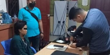 Pelaku saat  menjalani pemeriksaan
Foto: IST