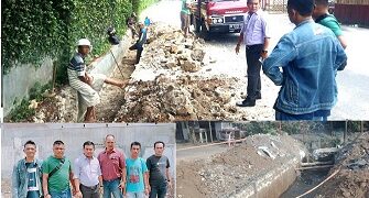 Andika Prayogi Sinaga bersama masyarakat di lokasi pembangunan drainase dan gorong-gorong