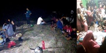 Masyarakat turut menunggu di tepi sungai dan jenazah di rumah duka