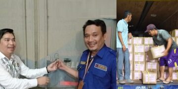 Ketua KPU Siantar dan Ketua Bawaslu Siantar saat akan membuka truk pembawa logistik