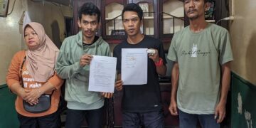 Kedua belah pihak perlihatkan surat perdamaian